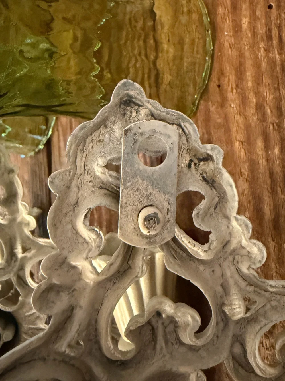 (2) vintage cast metal candle wall sconces paired with green glass votive cups